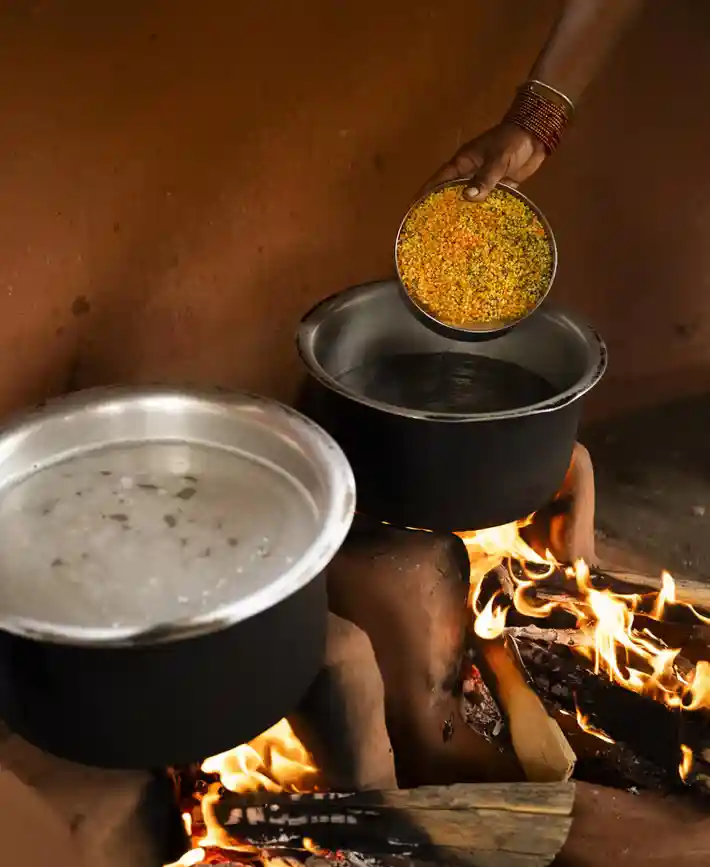 Traditional dishes cooking over an open fire