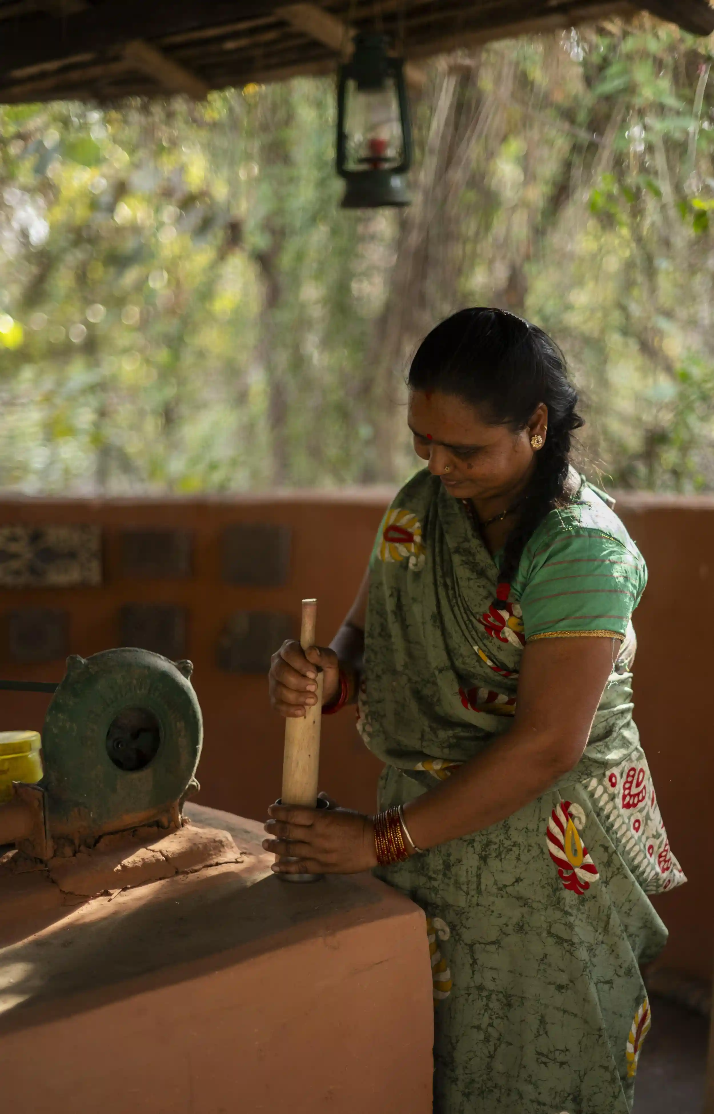 Woman preparing ingredients in the lodge kitchen