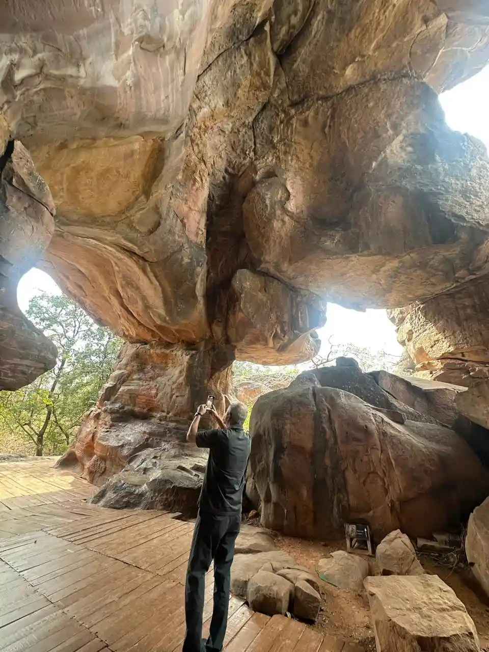 Guest exploring a natural rock cave