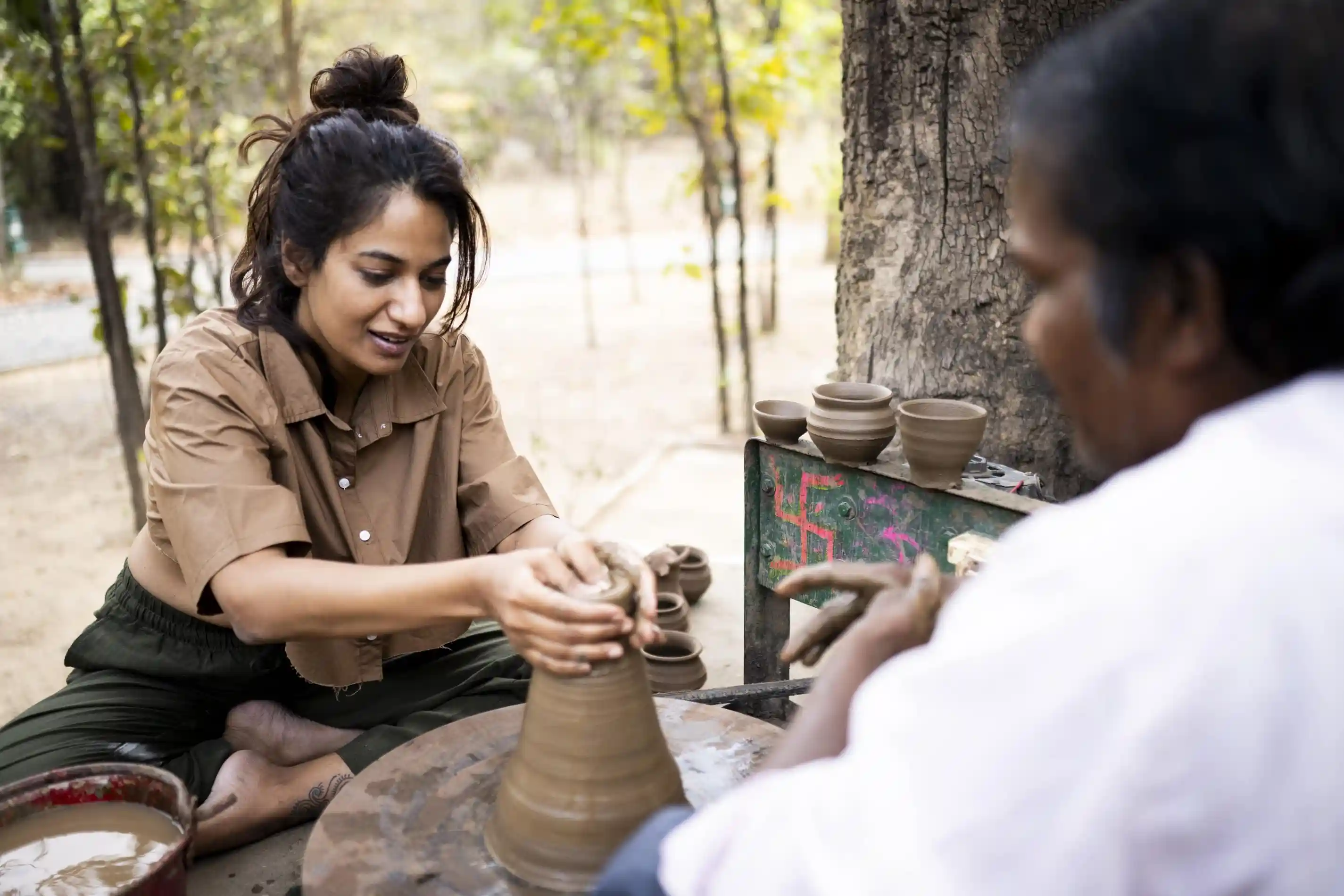 Guest learning traditional pottery